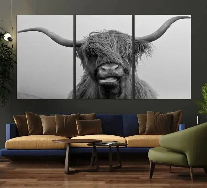 Texas Cow Wall Art Canvas Print in black and white, featuring a long-horned Highland cow, printed on museum-quality canvas with UV protection. It's perfect for enhancing any sophisticated space.