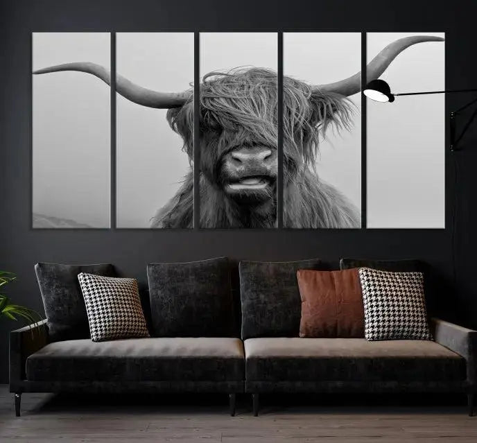 Texas Cow Wall Art Canvas Print in black and white, featuring a long-horned Highland cow, printed on museum-quality canvas with UV protection. It's perfect for enhancing any sophisticated space.