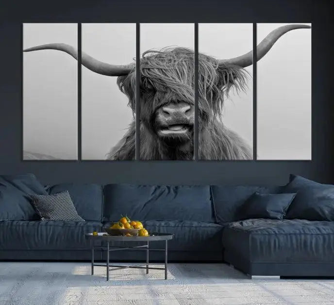 Texas Cow Wall Art Canvas Print in black and white, featuring a long-horned Highland cow, printed on museum-quality canvas with UV protection. It's perfect for enhancing any sophisticated space.