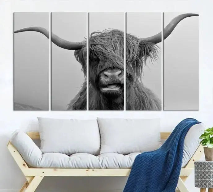 Texas Cow Wall Art Canvas Print in black and white, featuring a long-horned Highland cow, printed on museum-quality canvas with UV protection. It's perfect for enhancing any sophisticated space.