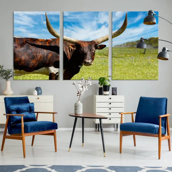 The Texas Longhorn Cow Wall Art Animal Canvas Print is a three-panel portrayal of a longhorn cow in a grassy field on museum-quality canvas with UV-protective coating.