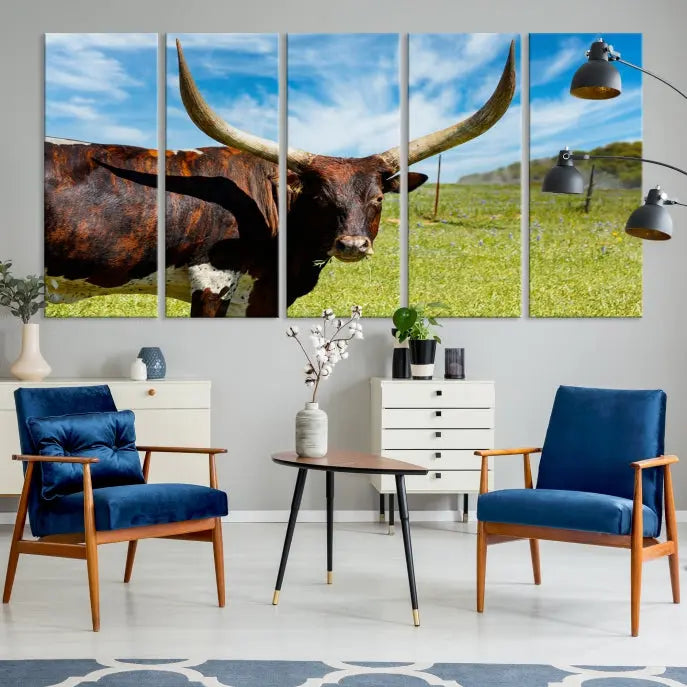 The Texas Longhorn Cow Wall Art Animal Canvas Print is a three-panel portrayal of a longhorn cow in a grassy field on museum-quality canvas with UV-protective coating.