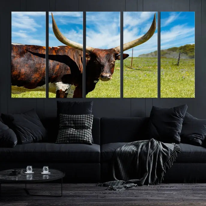 The Texas Longhorn Cow Wall Art Animal Canvas Print is a three-panel portrayal of a longhorn cow in a grassy field on museum-quality canvas with UV-protective coating.