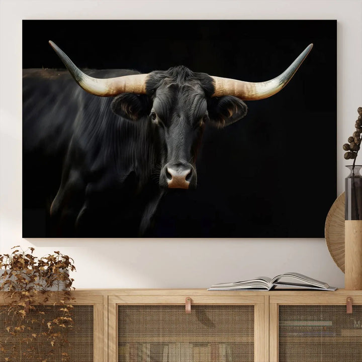 The "Texas Longhorn Cow | Majestic Black Bull Wall Art Canvas Print" introduces rustic charm to a chic sitting area.