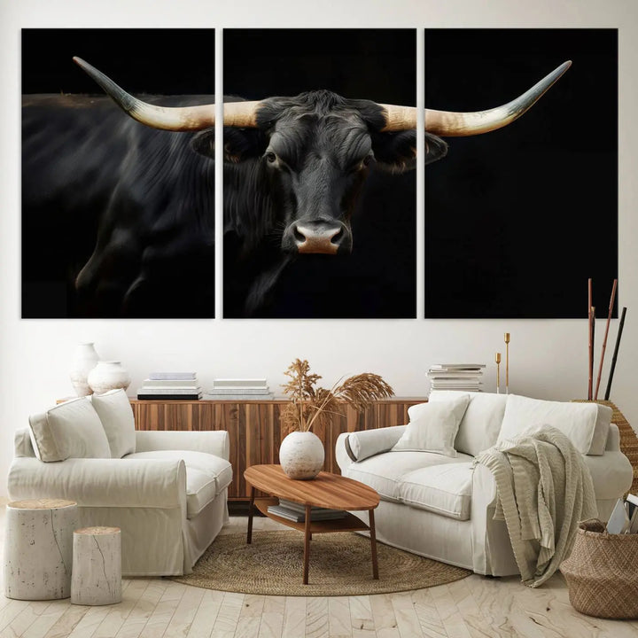 The "Texas Longhorn Cow | Majestic Black Bull Wall Art Canvas Print" introduces rustic charm to a chic sitting area.