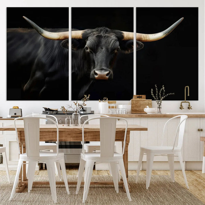 The living room exudes rustic charm with the Majestic Black Bull Wall Art Canvas Print, showcasing a Texas Longhorn cow with large horns.