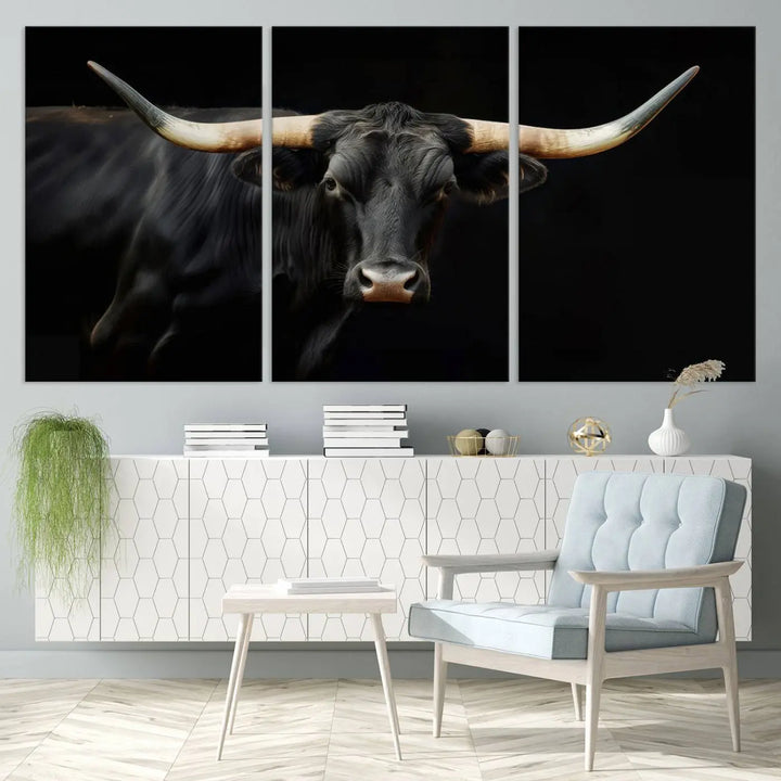 The living room exudes rustic charm with the Majestic Black Bull Wall Art Canvas Print, showcasing a Texas Longhorn cow with large horns.