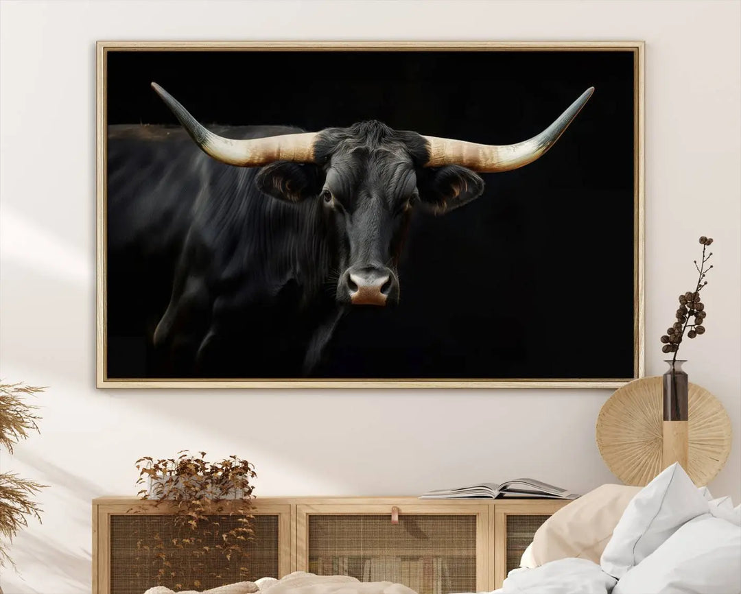 The living room exudes rustic charm with the Majestic Black Bull Wall Art Canvas Print, showcasing a Texas Longhorn cow with large horns.