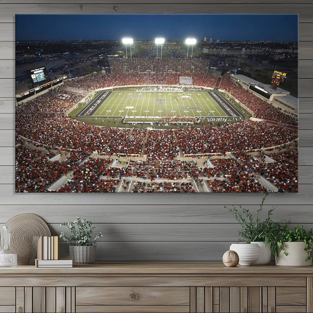 The Texas Tech Red Raiders Football Team Print, featuring Lubbock's Jones AT&T Stadium on a high-quality canvas, serves as stunning wall art that enriches the modern living room.