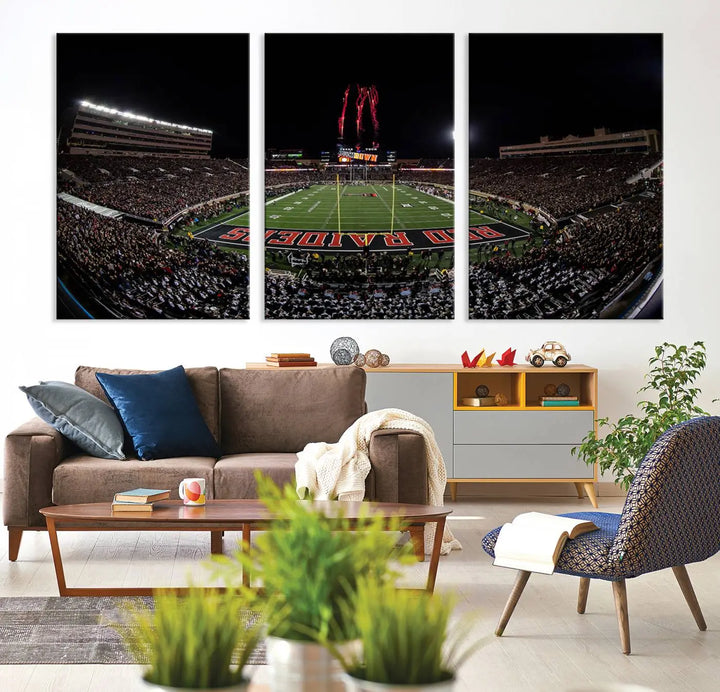 A modern living room is beautifully decorated with the "Texas Tech Red Raiders Football Team Print - Lubbock Jones AT&T Stadium Wall Art Canvas Print," showcasing a bustling football stadium. This gallery-quality canvas print exudes vibrancy and elegance.