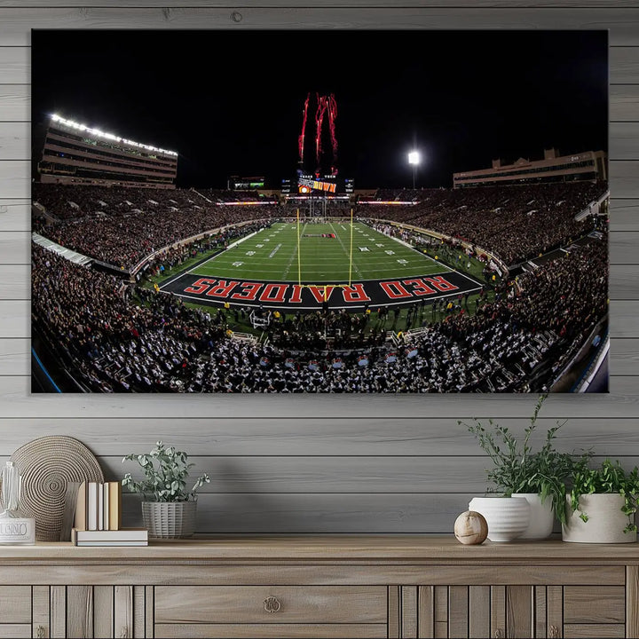 A modern living room is beautifully decorated with the "Texas Tech Red Raiders Football Team Print - Lubbock Jones AT&T Stadium Wall Art Canvas Print," showcasing a bustling football stadium. This gallery-quality canvas print exudes vibrancy and elegance.