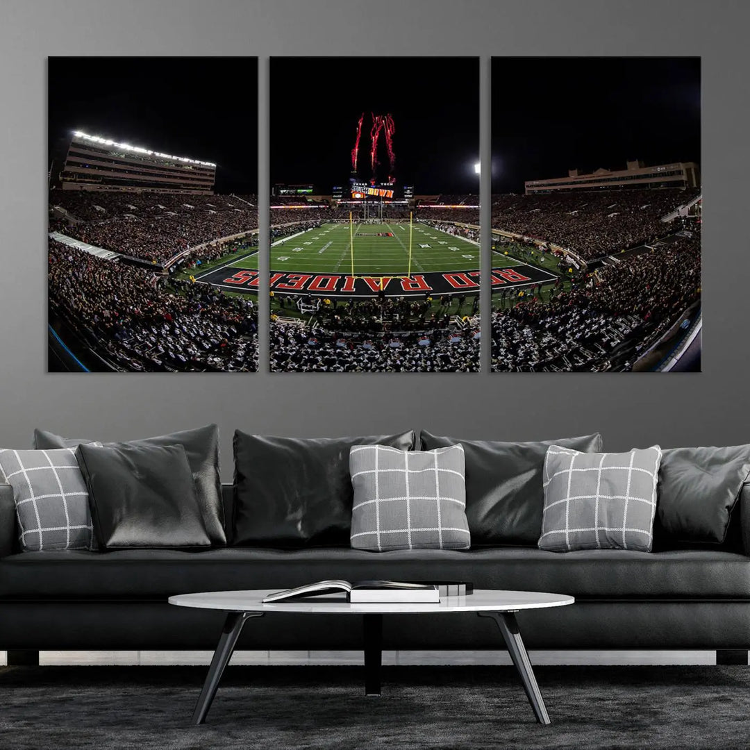 A modern living room is beautifully decorated with the "Texas Tech Red Raiders Football Team Print - Lubbock Jones AT&T Stadium Wall Art Canvas Print," showcasing a bustling football stadium. This gallery-quality canvas print exudes vibrancy and elegance.