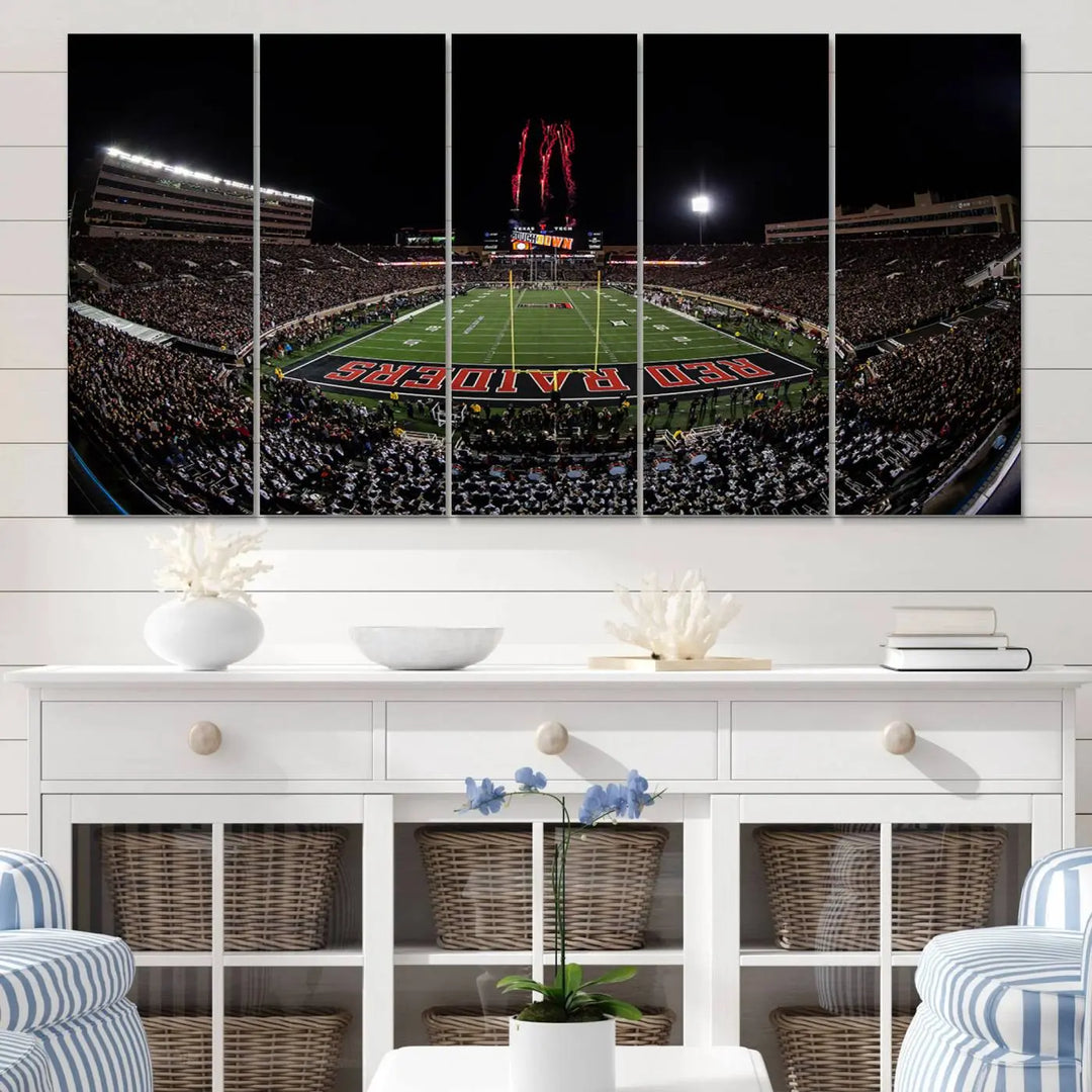 A modern living room is beautifully decorated with the "Texas Tech Red Raiders Football Team Print - Lubbock Jones AT&T Stadium Wall Art Canvas Print," showcasing a bustling football stadium. This gallery-quality canvas print exudes vibrancy and elegance.