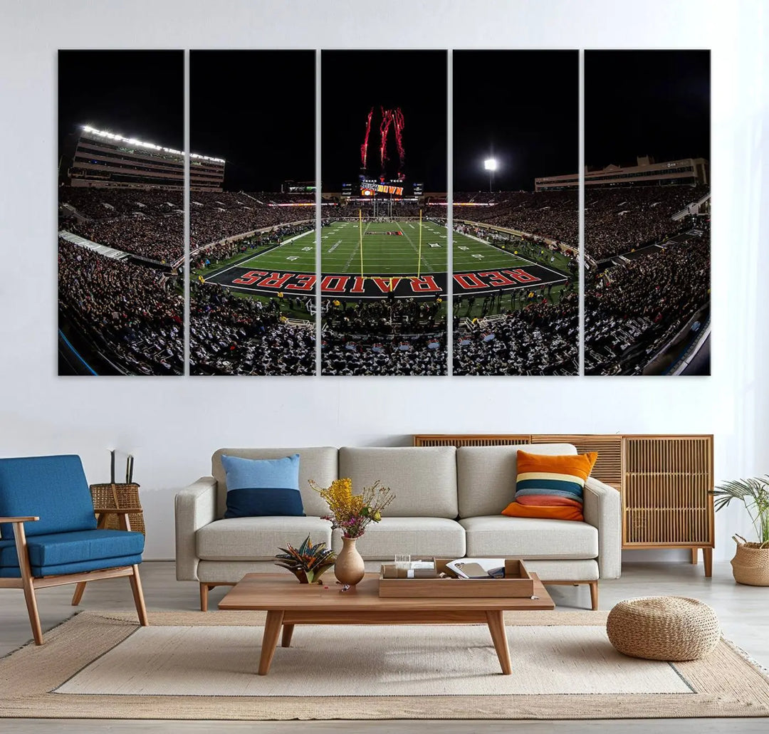 A modern living room is beautifully decorated with the "Texas Tech Red Raiders Football Team Print - Lubbock Jones AT&T Stadium Wall Art Canvas Print," showcasing a bustling football stadium. This gallery-quality canvas print exudes vibrancy and elegance.