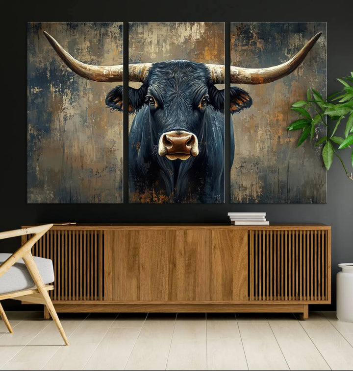 A Texas Western wall art triptych titled "Abstract Cow Longhorn Bull Wall Art Canvas Print" hangs majestically, showcasing its intricate design and bold presence.