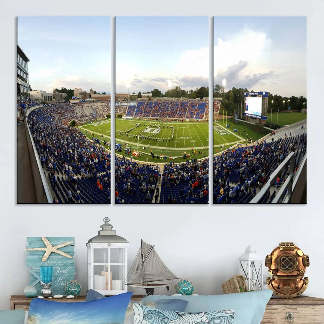 The living room showcases "The Duke University Blue Devils Football Team Print," a split-panel wall art capturing the lively atmosphere of Durham Wallace Wade Stadium. This canvas print is ready to hang and crafted to museum quality standards.