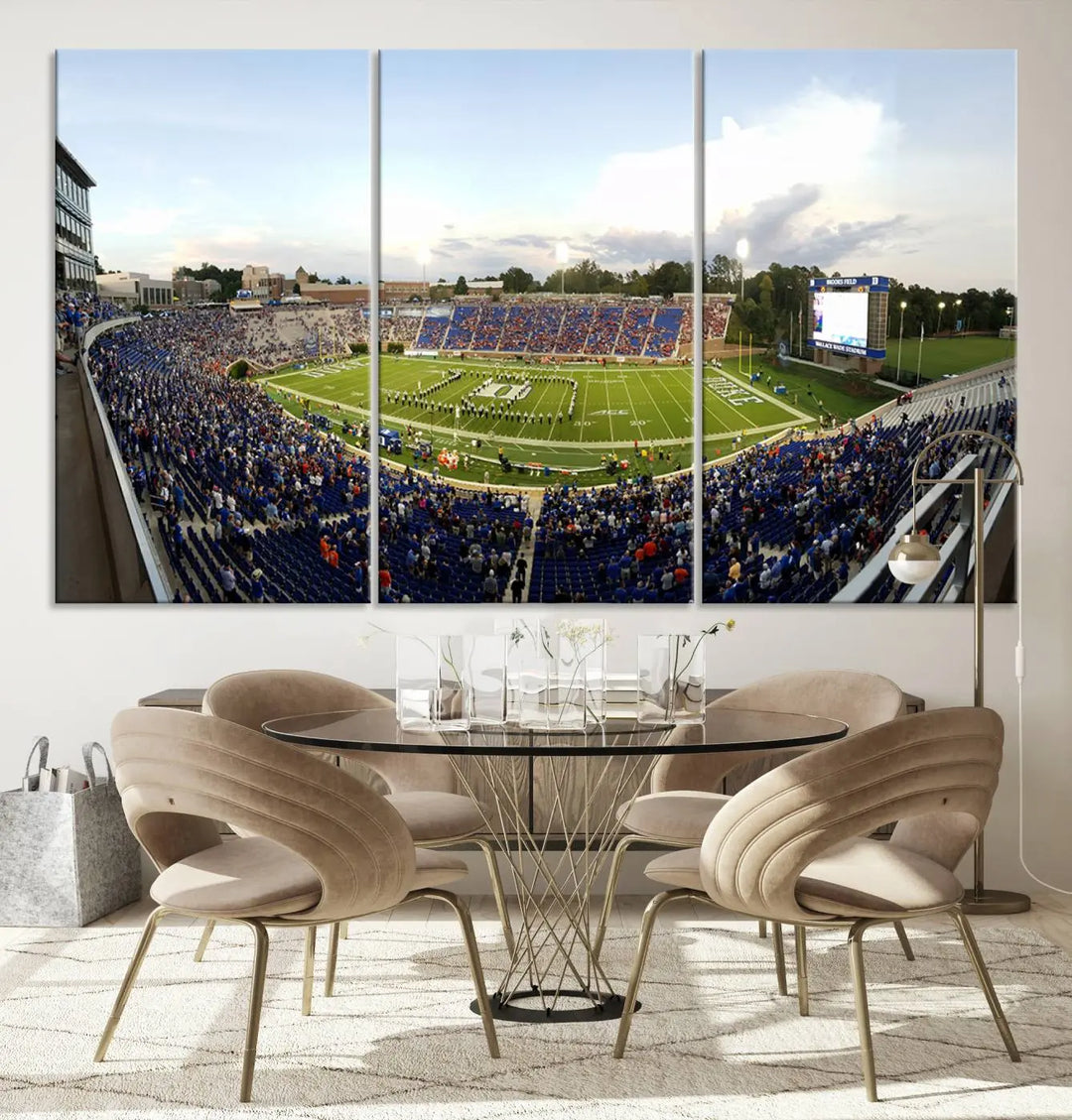 The living room showcases "The Duke University Blue Devils Football Team Print," a split-panel wall art capturing the lively atmosphere of Durham Wallace Wade Stadium. This canvas print is ready to hang and crafted to museum quality standards.