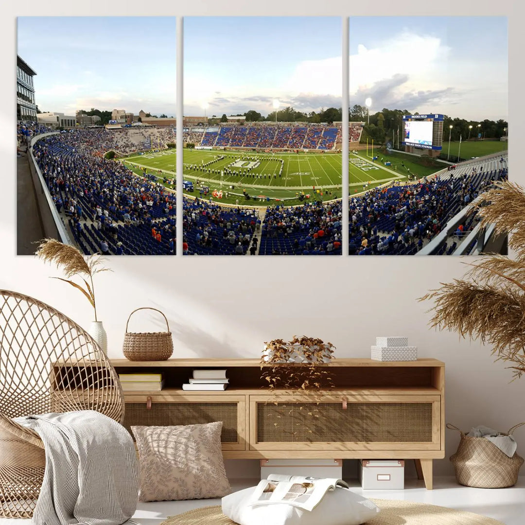 The living room showcases "The Duke University Blue Devils Football Team Print," a split-panel wall art capturing the lively atmosphere of Durham Wallace Wade Stadium. This canvas print is ready to hang and crafted to museum quality standards.