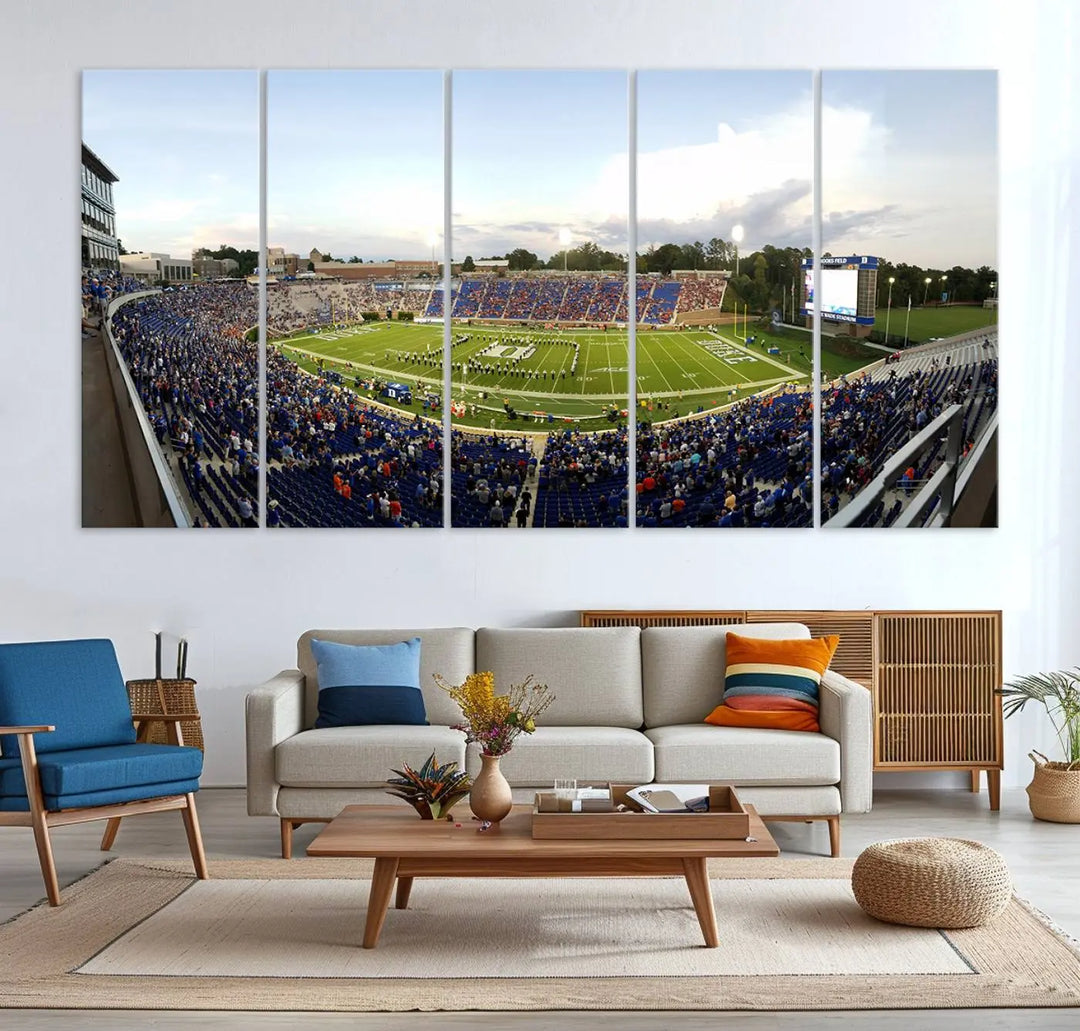 The living room showcases "The Duke University Blue Devils Football Team Print," a split-panel wall art capturing the lively atmosphere of Durham Wallace Wade Stadium. This canvas print is ready to hang and crafted to museum quality standards.