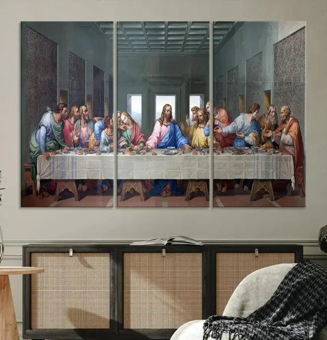 The room showcases The Last Supper Multi Panel Canvas Wall Art displayed above the couch, printed on museum-quality polycotton canvas.