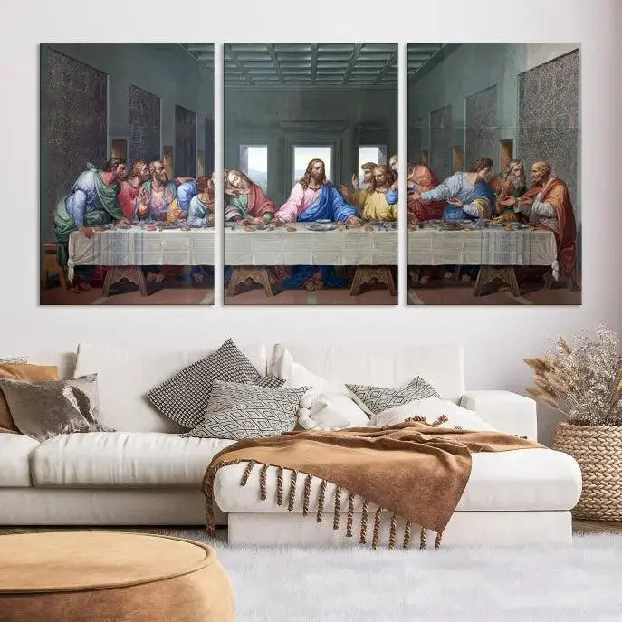 A triptych called The Last Supper Multi Panel Canvas Wall Art, printed on gallery-wrapped museum-quality polycotton canvas, is displayed in a modern living room.