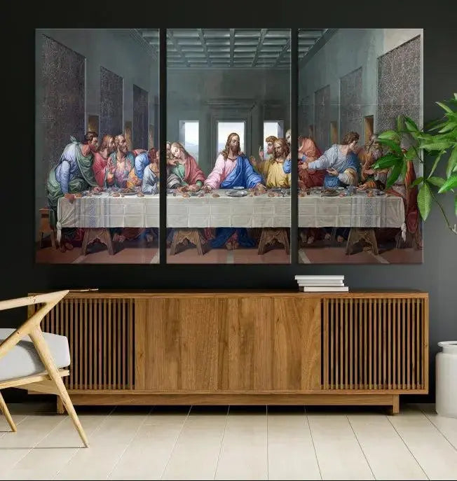 A triptych called The Last Supper Multi Panel Canvas Wall Art, printed on gallery-wrapped museum-quality polycotton canvas, is displayed in a modern living room.