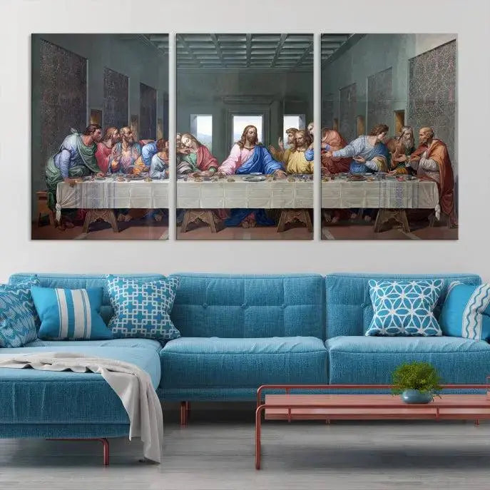 A triptych called The Last Supper Multi Panel Canvas Wall Art, printed on gallery-wrapped museum-quality polycotton canvas, is displayed in a modern living room.