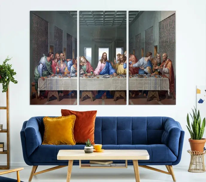 A triptych called The Last Supper Multi Panel Canvas Wall Art, printed on gallery-wrapped museum-quality polycotton canvas, is displayed in a modern living room.