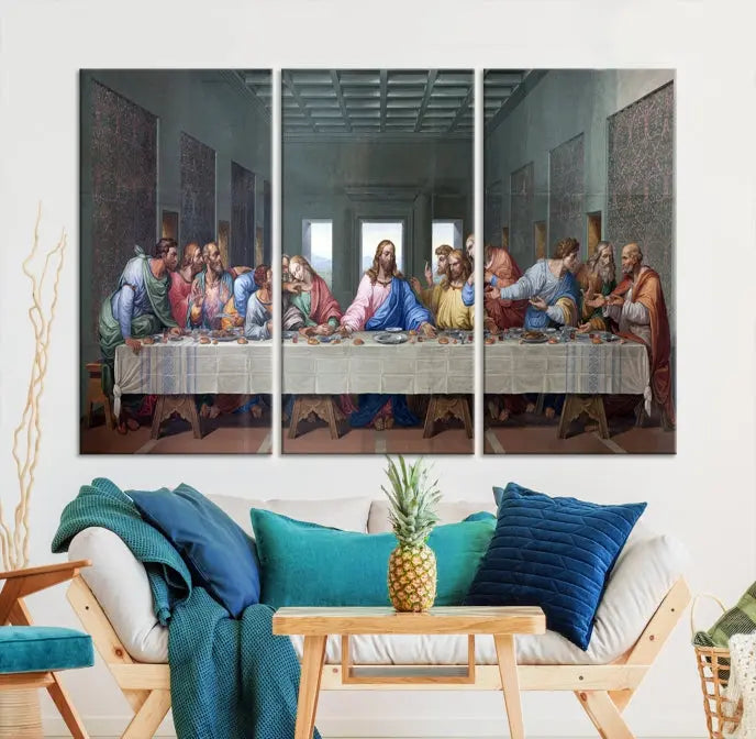 A triptych called The Last Supper Multi Panel Canvas Wall Art, printed on gallery-wrapped museum-quality polycotton canvas, is displayed in a modern living room.