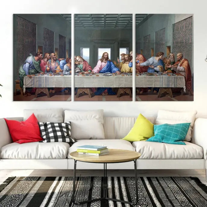 A triptych called The Last Supper Multi Panel Canvas Wall Art, printed on gallery-wrapped museum-quality polycotton canvas, is displayed in a modern living room.