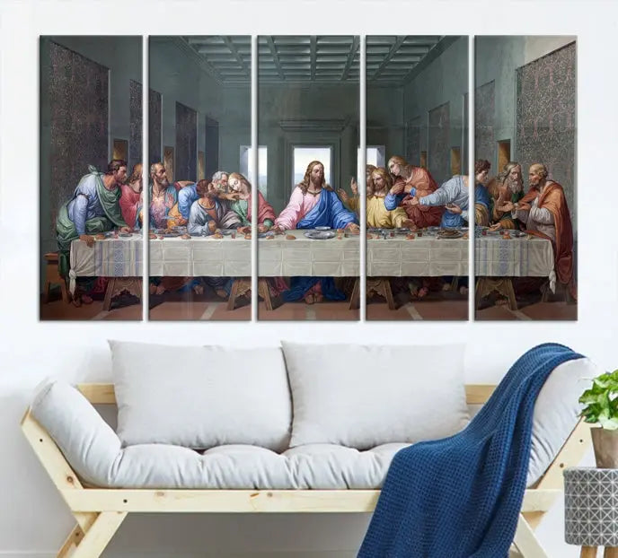 A triptych called The Last Supper Multi Panel Canvas Wall Art, printed on gallery-wrapped museum-quality polycotton canvas, is displayed in a modern living room.