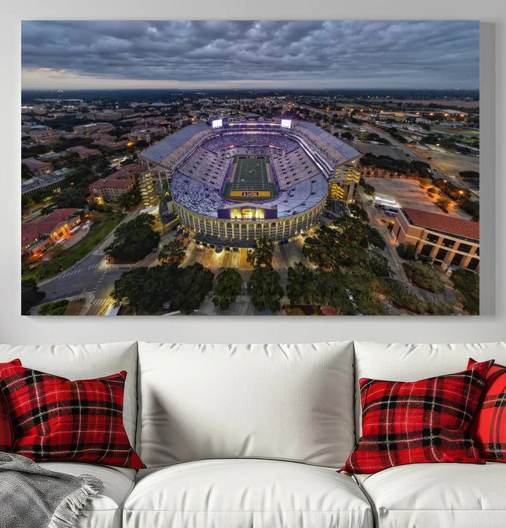 A stunning three-panel aerial view of the Louisiana State University Tigers' Tiger Stadium at dusk, set against a bustling cityscape. This captivating scene is elegantly displayed as a canvas artwork in a sleek wood frame, creating an impressive piece of wall art.