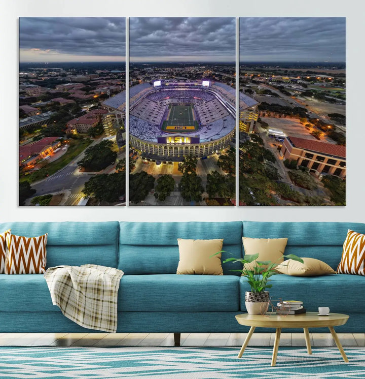 A stunning three-panel aerial view of the Louisiana State University Tigers' Tiger Stadium at dusk, set against a bustling cityscape. This captivating scene is elegantly displayed as a canvas artwork in a sleek wood frame, creating an impressive piece of wall art.