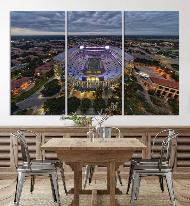 A stunning three-panel aerial view of the Louisiana State University Tigers' Tiger Stadium at dusk, set against a bustling cityscape. This captivating scene is elegantly displayed as a canvas artwork in a sleek wood frame, creating an impressive piece of wall art.