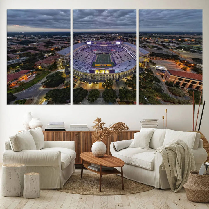 A stunning three-panel aerial view of the Louisiana State University Tigers' Tiger Stadium at dusk, set against a bustling cityscape. This captivating scene is elegantly displayed as a canvas artwork in a sleek wood frame, creating an impressive piece of wall art.