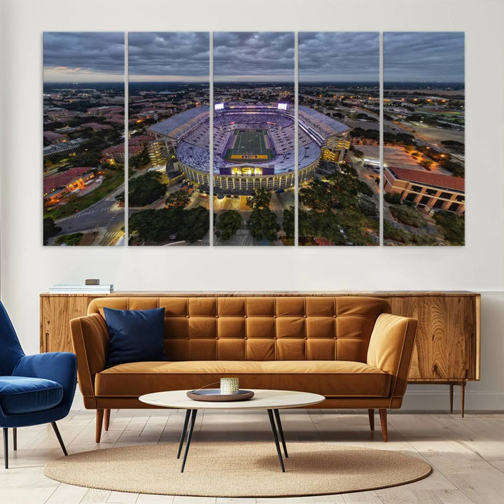 A stunning three-panel aerial view of the Louisiana State University Tigers' Tiger Stadium at dusk, set against a bustling cityscape. This captivating scene is elegantly displayed as a canvas artwork in a sleek wood frame, creating an impressive piece of wall art.