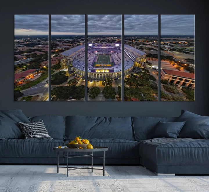 A stunning three-panel aerial view of the Louisiana State University Tigers' Tiger Stadium at dusk, set against a bustling cityscape. This captivating scene is elegantly displayed as a canvas artwork in a sleek wood frame, creating an impressive piece of wall art.