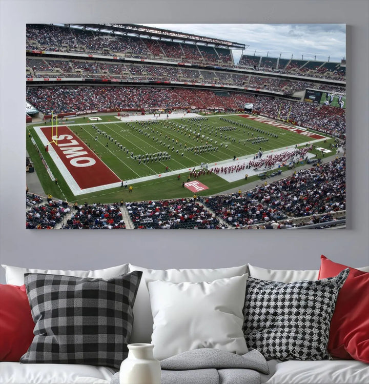 The triptych wall art depicts a vibrant sports stadium scene and captures attention. Titled "The Temple University Owls Athletics Team Print - Philadelphia Lincoln Financial Field Stadium Wall Art Canvas Print," each piece is handmade in the USA on premium canvas, adding an authentic touch to your decor.