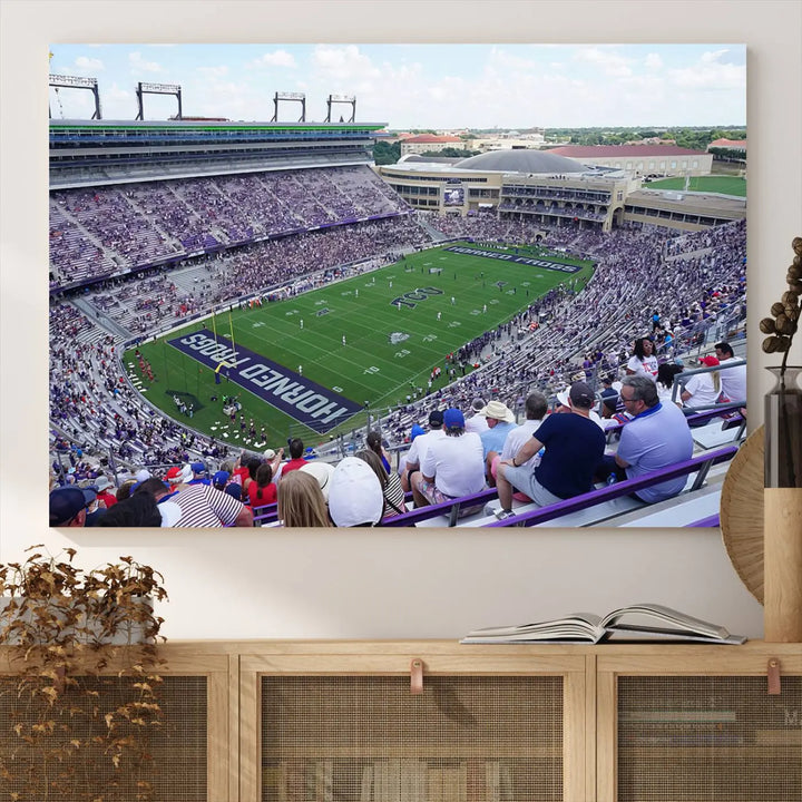 The Texas Christian University TCU Horned Frogs Football Team Print, featuring a stunning view of the packed Amon G. Carter Stadium in Fort Worth, is elegantly displayed with its gallery-quality canvas finish adding a sophisticated touch.