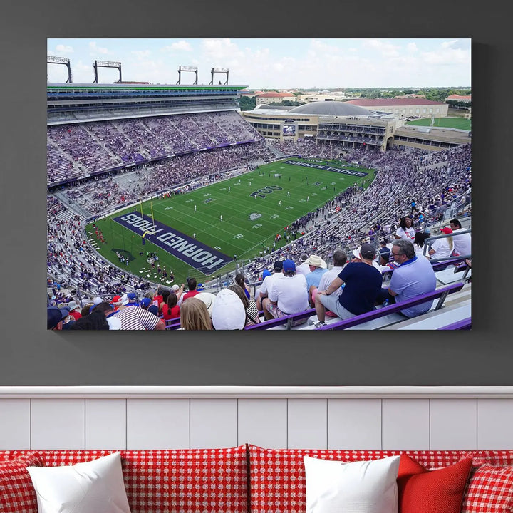 The Texas Christian University TCU Horned Frogs Football Team Print, featuring a stunning view of the packed Amon G. Carter Stadium in Fort Worth, is elegantly displayed with its gallery-quality canvas finish adding a sophisticated touch.