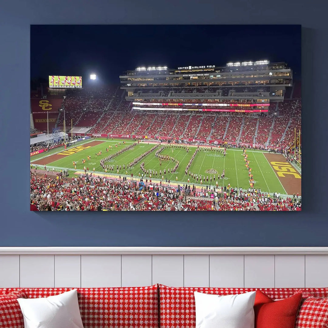 The University of Southern California USC Trojans Football Team Print - Los Angeles Memorial Coliseum Stadium Wall Art Canvas Print beautifully captures a bustling football stadium at night, featuring a marching band on the field. This piece boasts a gallery-quality finish that seamlessly complements any decor.