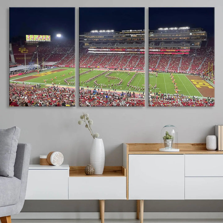 The University of Southern California USC Trojans Football Team Print - Los Angeles Memorial Coliseum Stadium Wall Art Canvas Print beautifully captures a bustling football stadium at night, featuring a marching band on the field. This piece boasts a gallery-quality finish that seamlessly complements any decor.