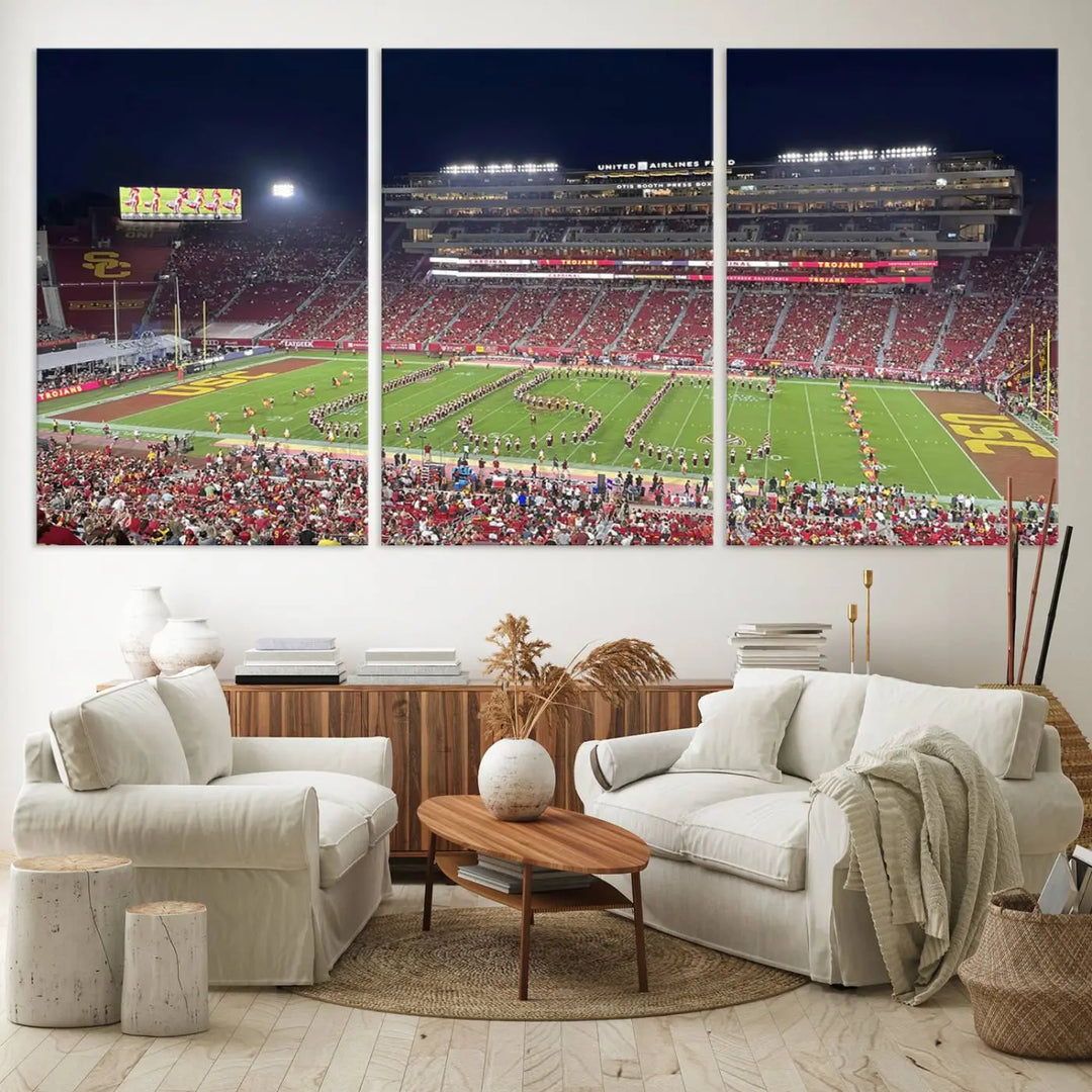 The University of Southern California USC Trojans Football Team Print - Los Angeles Memorial Coliseum Stadium Wall Art Canvas Print beautifully captures a bustling football stadium at night, featuring a marching band on the field. This piece boasts a gallery-quality finish that seamlessly complements any decor.