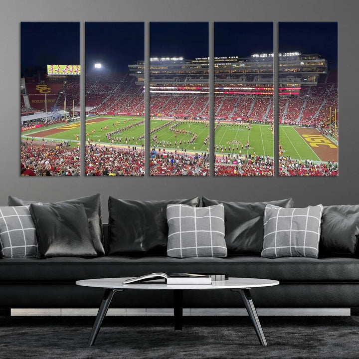 The University of Southern California USC Trojans Football Team Print - Los Angeles Memorial Coliseum Stadium Wall Art Canvas Print beautifully captures a bustling football stadium at night, featuring a marching band on the field. This piece boasts a gallery-quality finish that seamlessly complements any decor.