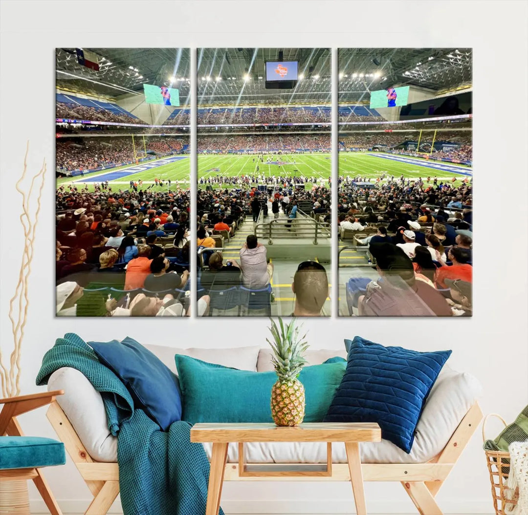 The living room features a large canvas print of the University of Texas at San Antonio Roadrunners football team, showcasing the San Antonio Alamodome. This museum-quality artwork enhances the space with its striking imagery.