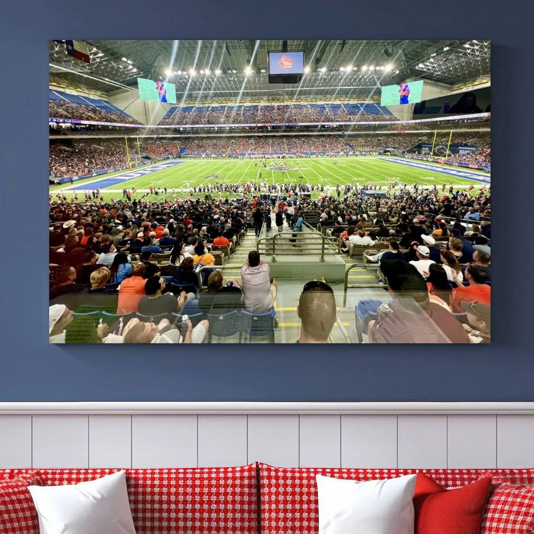 The living room features a large canvas print of the University of Texas at San Antonio Roadrunners football team, showcasing the San Antonio Alamodome. This museum-quality artwork enhances the space with its striking imagery.