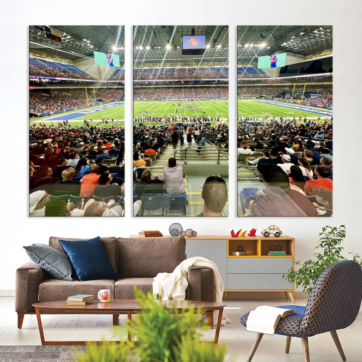 The living room features a large canvas print of the University of Texas at San Antonio Roadrunners football team, showcasing the San Antonio Alamodome. This museum-quality artwork enhances the space with its striking imagery.