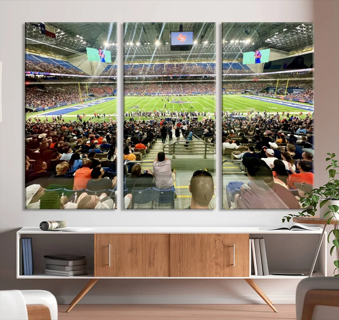 The living room features a large canvas print of the University of Texas at San Antonio Roadrunners football team, showcasing the San Antonio Alamodome. This museum-quality artwork enhances the space with its striking imagery.