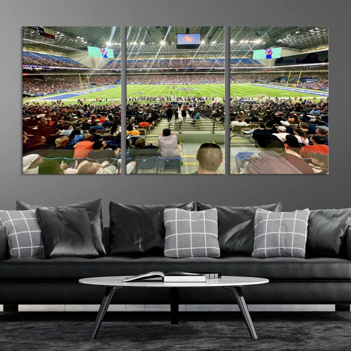 The living room features a large canvas print of the University of Texas at San Antonio Roadrunners football team, showcasing the San Antonio Alamodome. This museum-quality artwork enhances the space with its striking imagery.