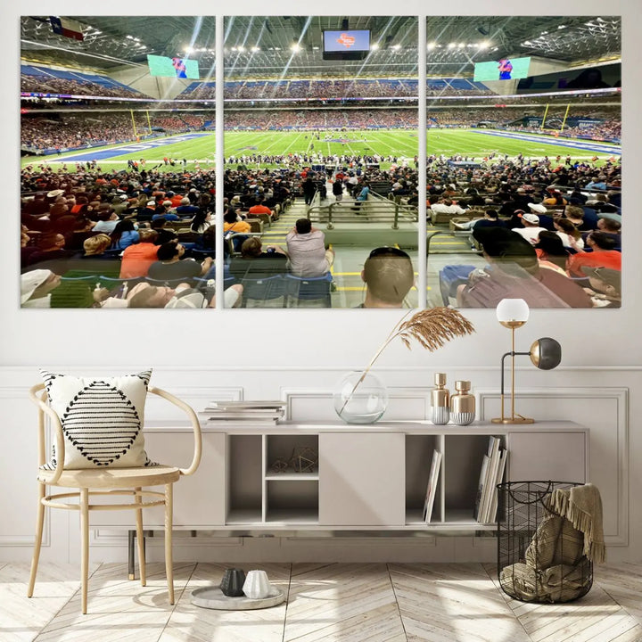 The living room features a large canvas print of the University of Texas at San Antonio Roadrunners football team, showcasing the San Antonio Alamodome. This museum-quality artwork enhances the space with its striking imagery.